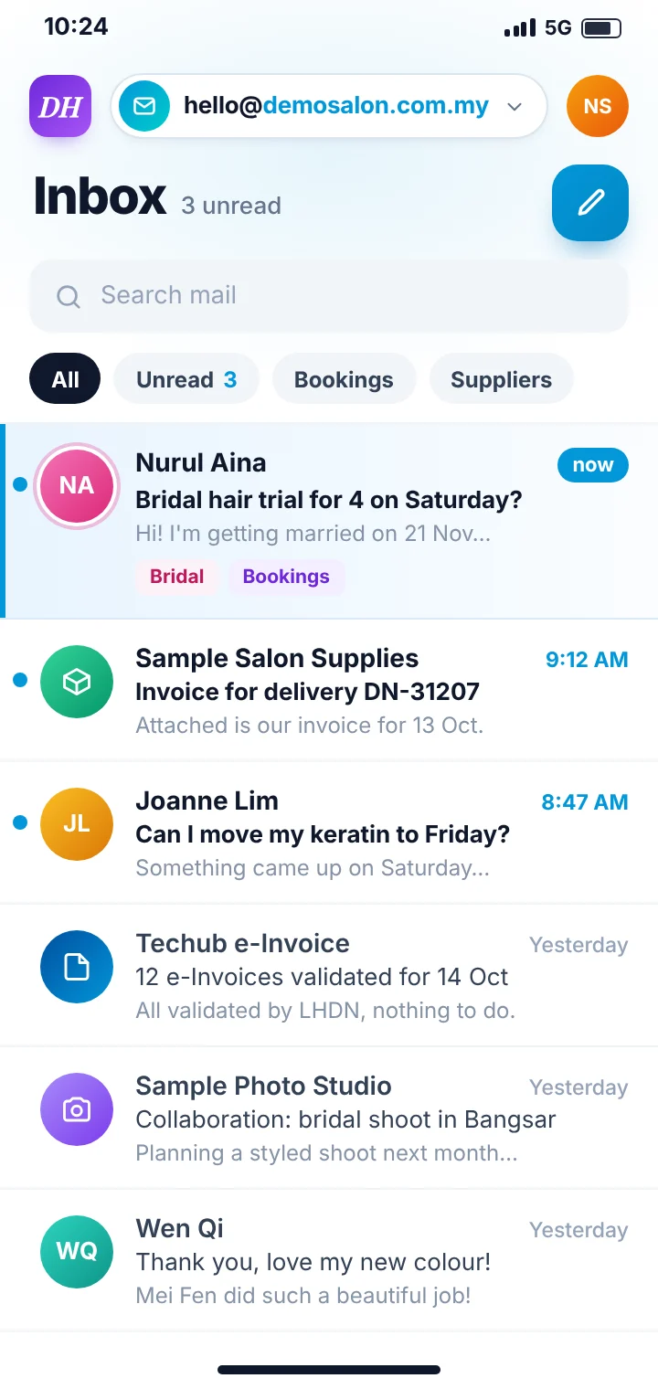 A new customer enquiry arriving in the salon's business email inbox on a phone