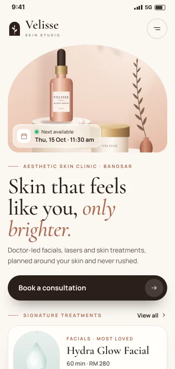 Website on a phone The skin clinic website on a phone with its headline and a Book button